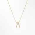 Gold necklace with 'A' pendant on a white background
