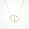 Gold necklace with a heart-shaped pendant on a white background
