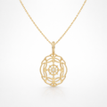 Gold necklace with a intricate pendant on a white background