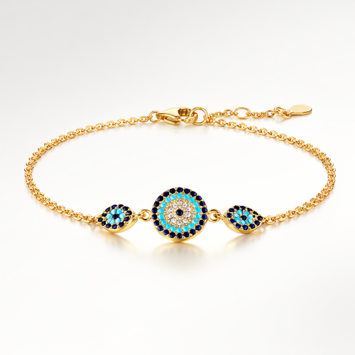 Gold bracelet with blue and black eye-shaped charms on a white background