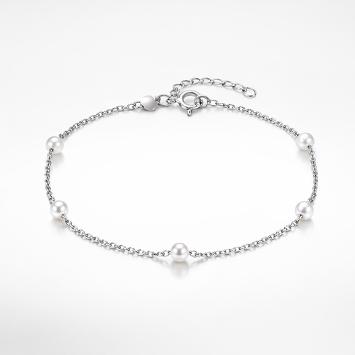 Silver bracelet with pearls on a white background