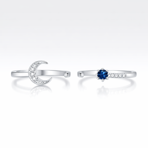 Two silver rings with gemstones on a white background
