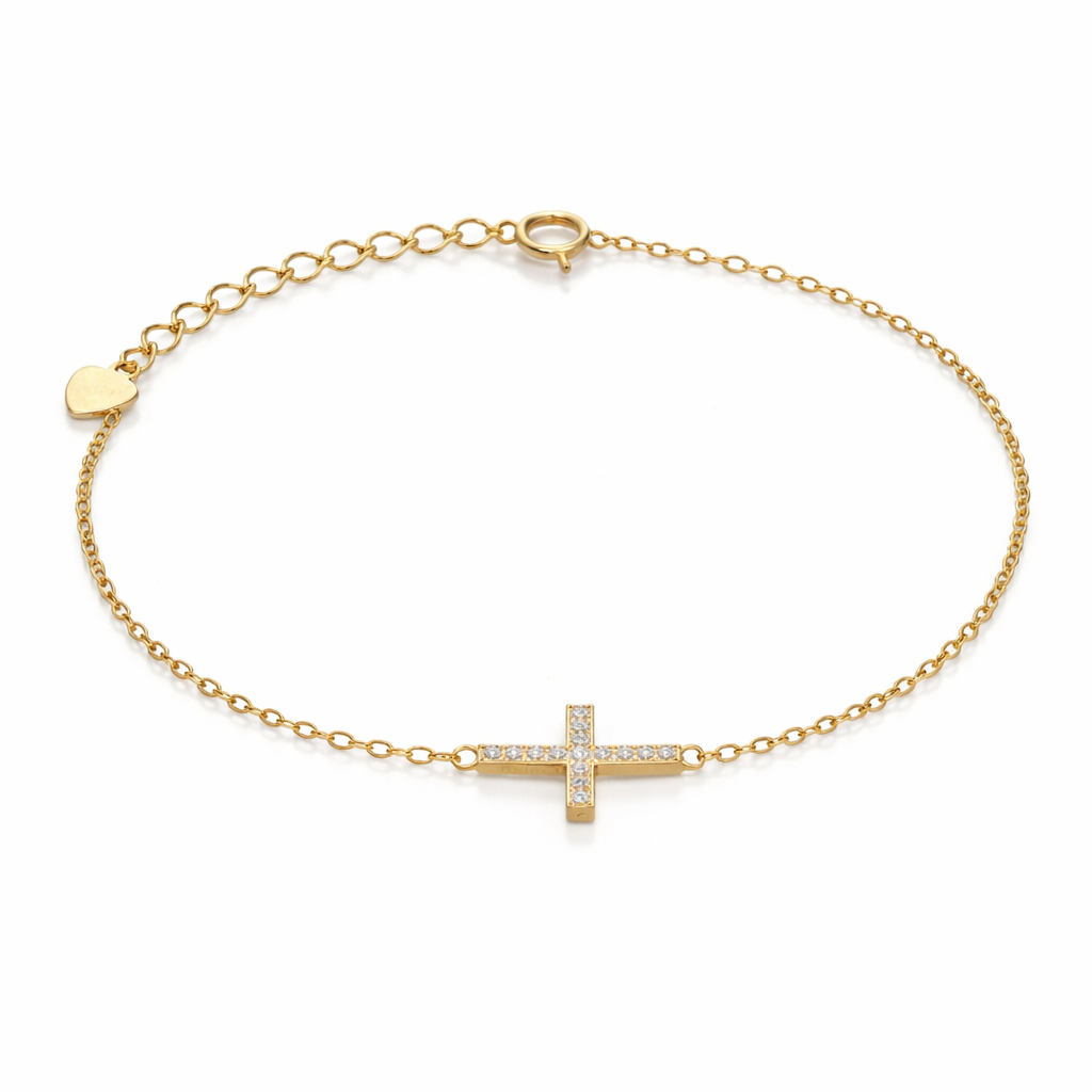Gold bracelet with a side-cross design on a white background