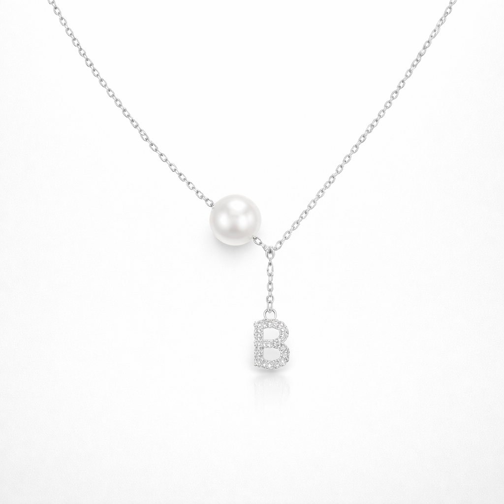 Necklace with a pearl pendant and 'B' letter charm on a white background