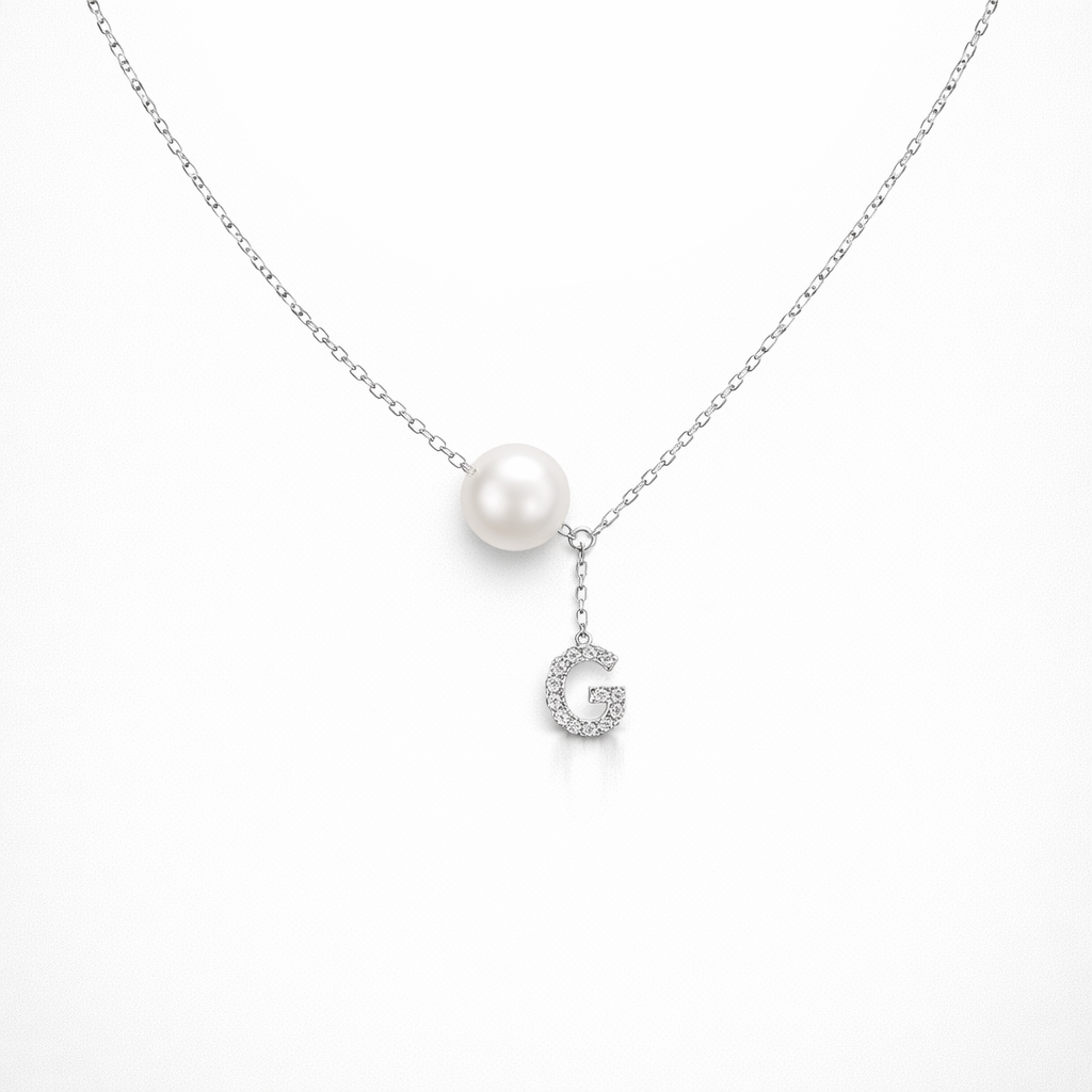 Pearl necklace with a 'G' pendant on a white background