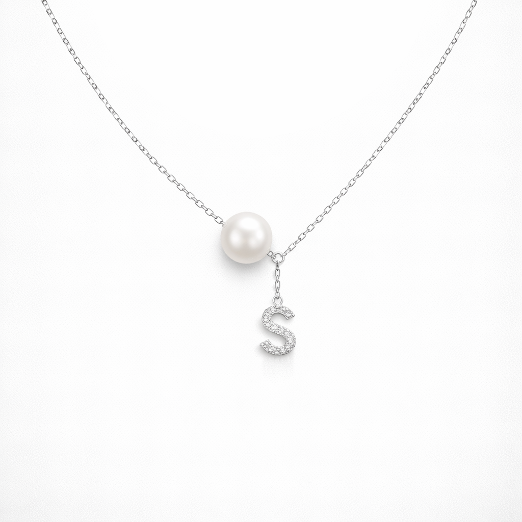 Necklace with a pearl pendant and 'S' initial on a white background