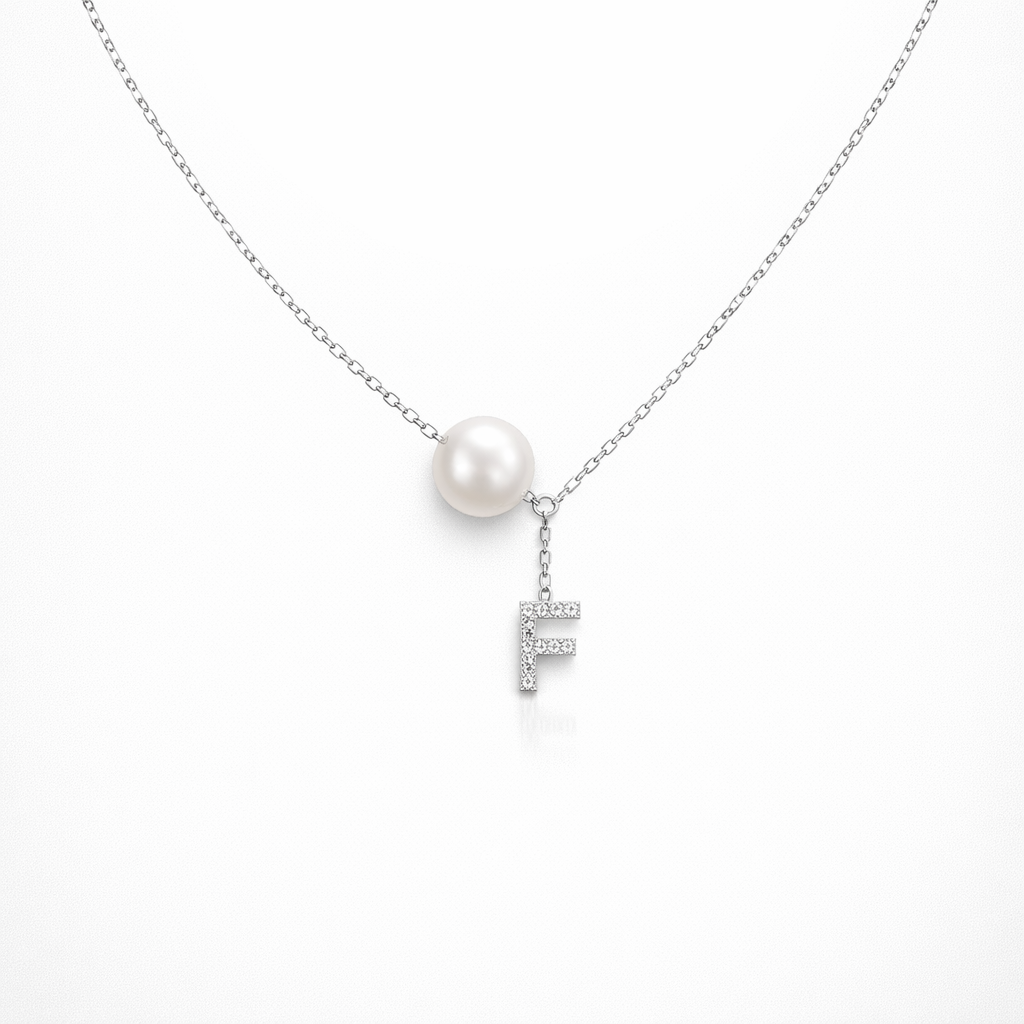 Necklace with a pearl pendant and letter 'F' charm on a white background