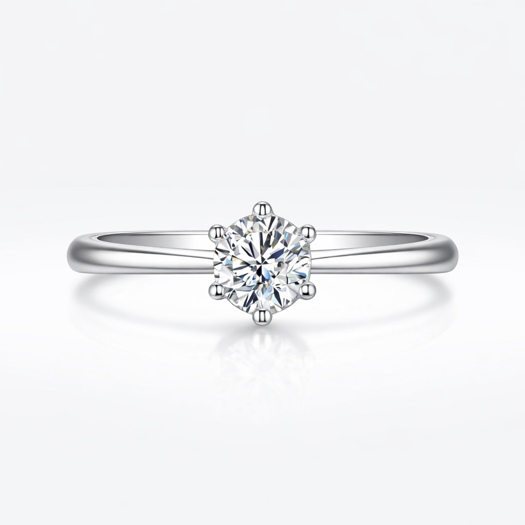 Silver ring with a diamond on a white background