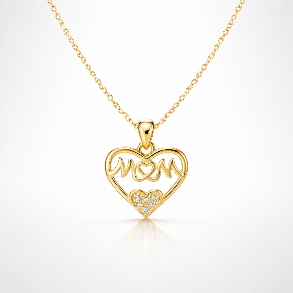 Gold necklace with a heart-shaped pendant on a white background