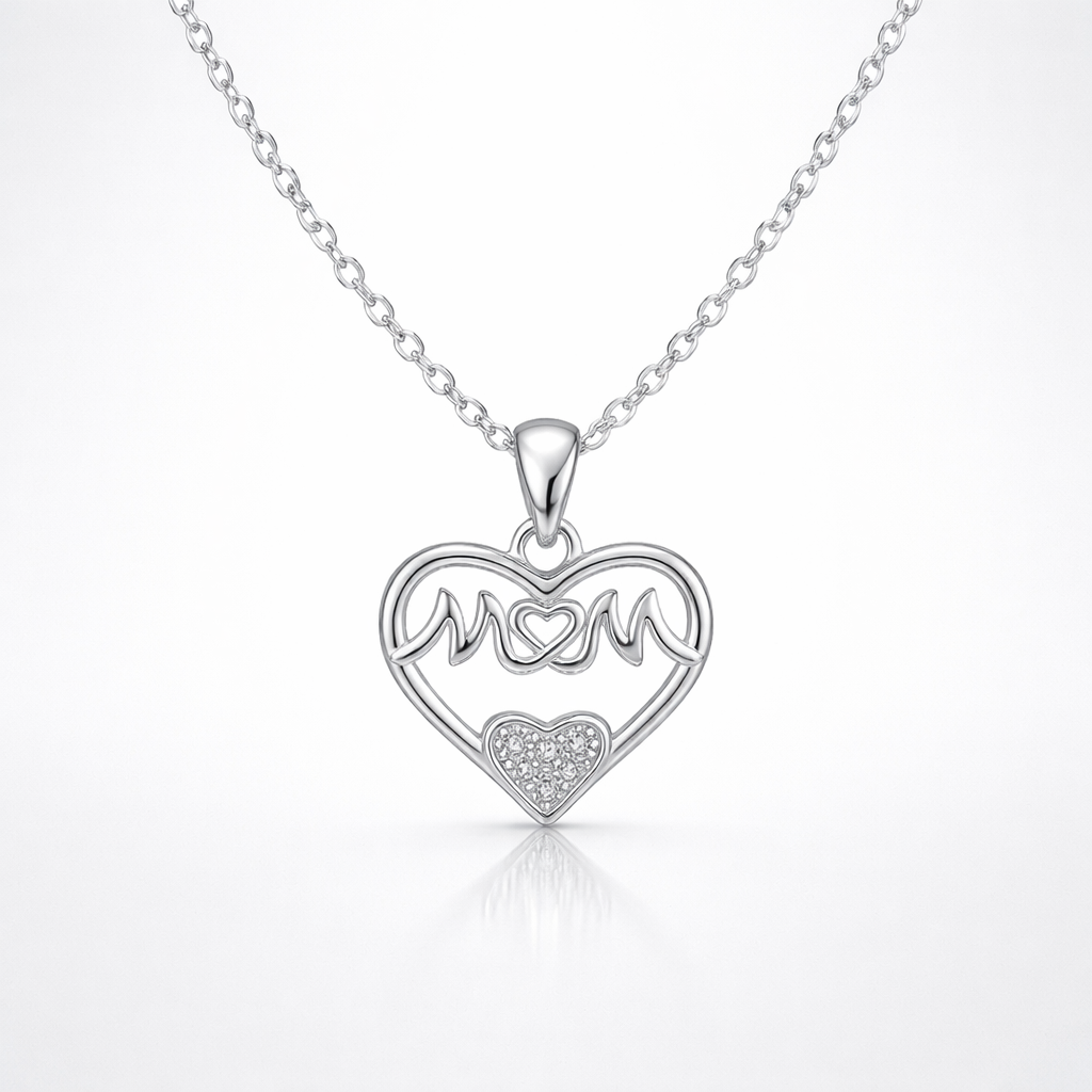 Silver necklace with a heart-shaped pendant featuring the word 'mom'.