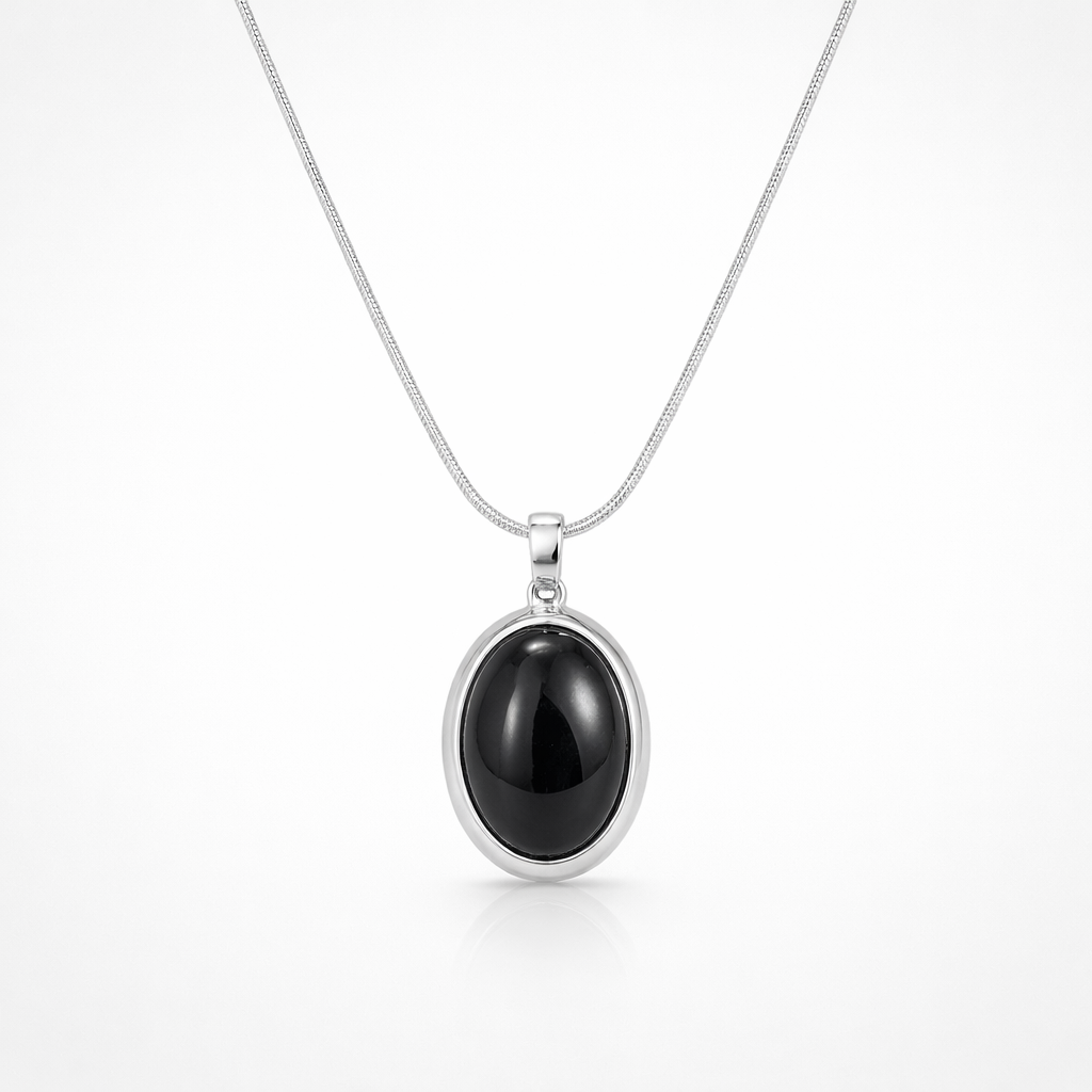 Black pendant necklace on a white background