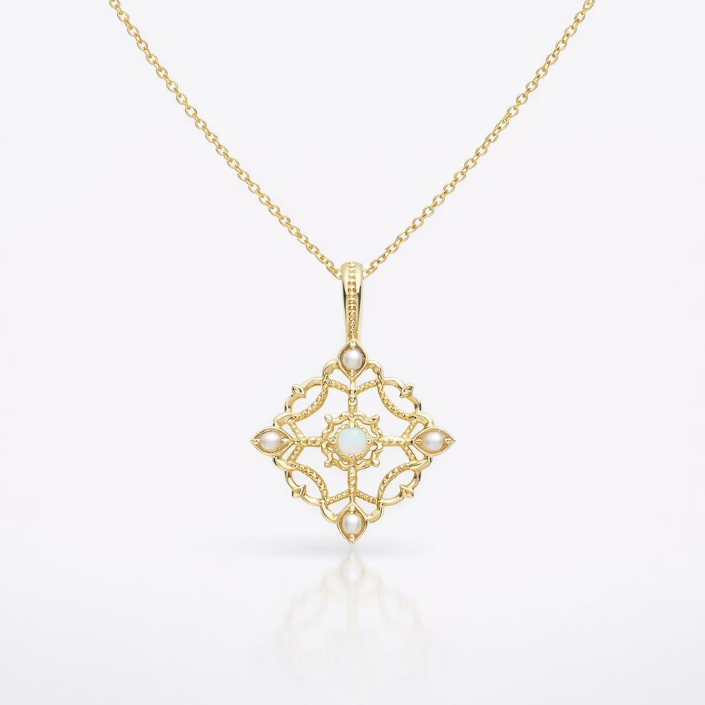 Gold necklace with a decorative pendant on a white background