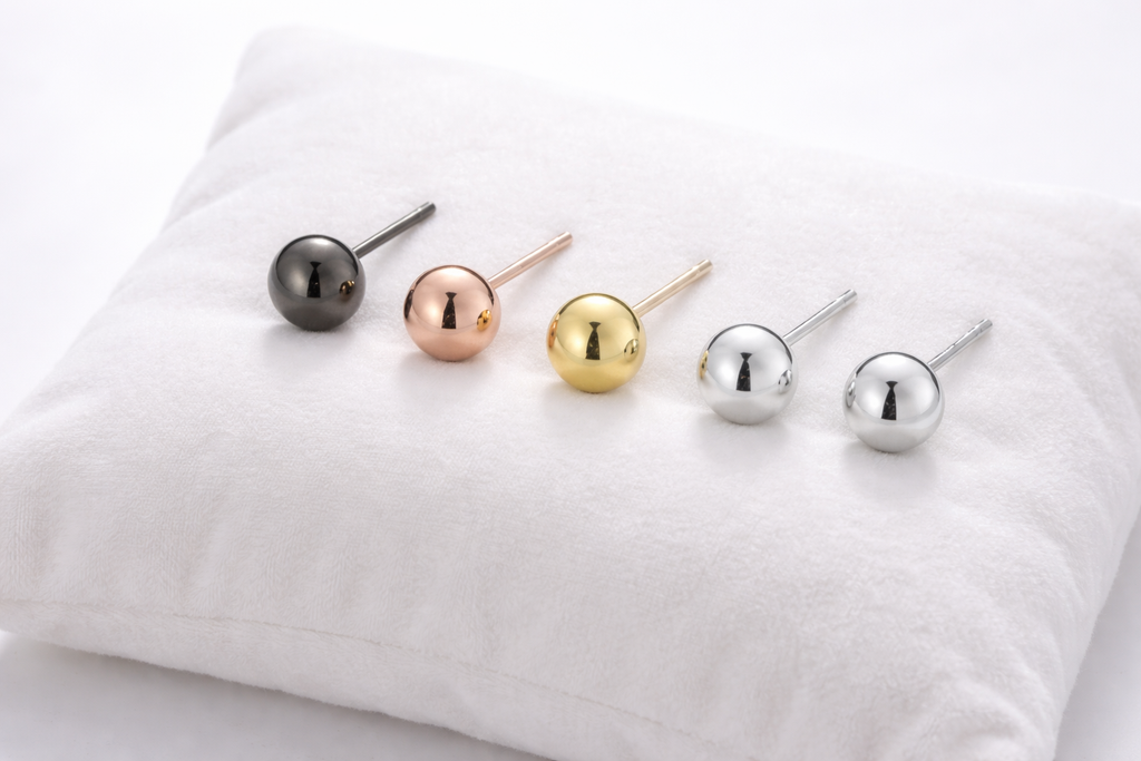 SILVER AND GOLD STUD EARRINGS