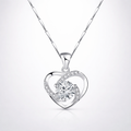 Silver heart-shaped pendant necklace on a white background