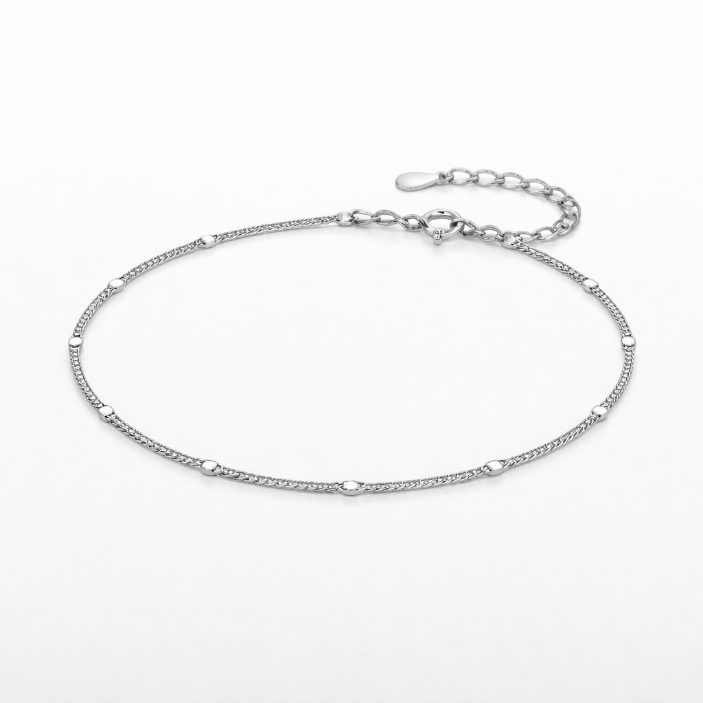 Silver chain bracelet on a white background