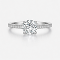 silver diamond ring on white background
