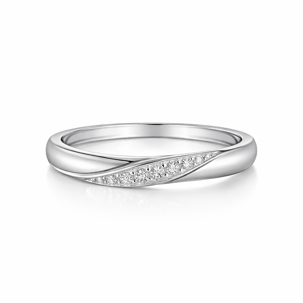 Silver ring with small diamonds on a white background