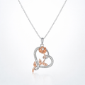 Silver and rose gold pendant necklace on a white background