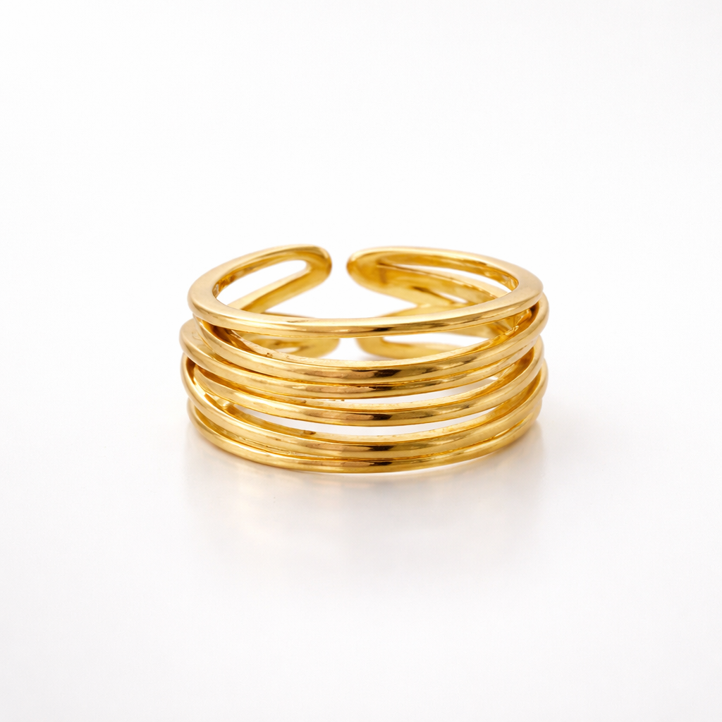 Gold open ring on a white background