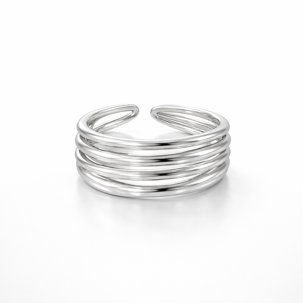 Silver multi-layered ring on a white background
