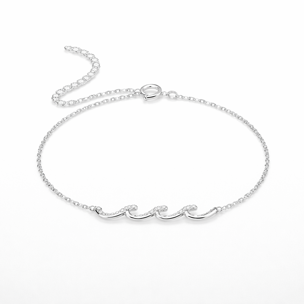 Silver bracelet with wave design on a white background
